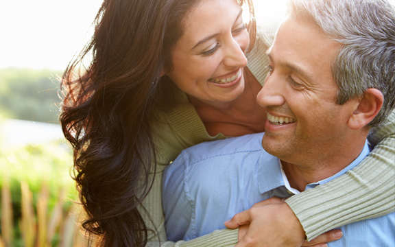 Man and Woman embracing in good health | OCFH