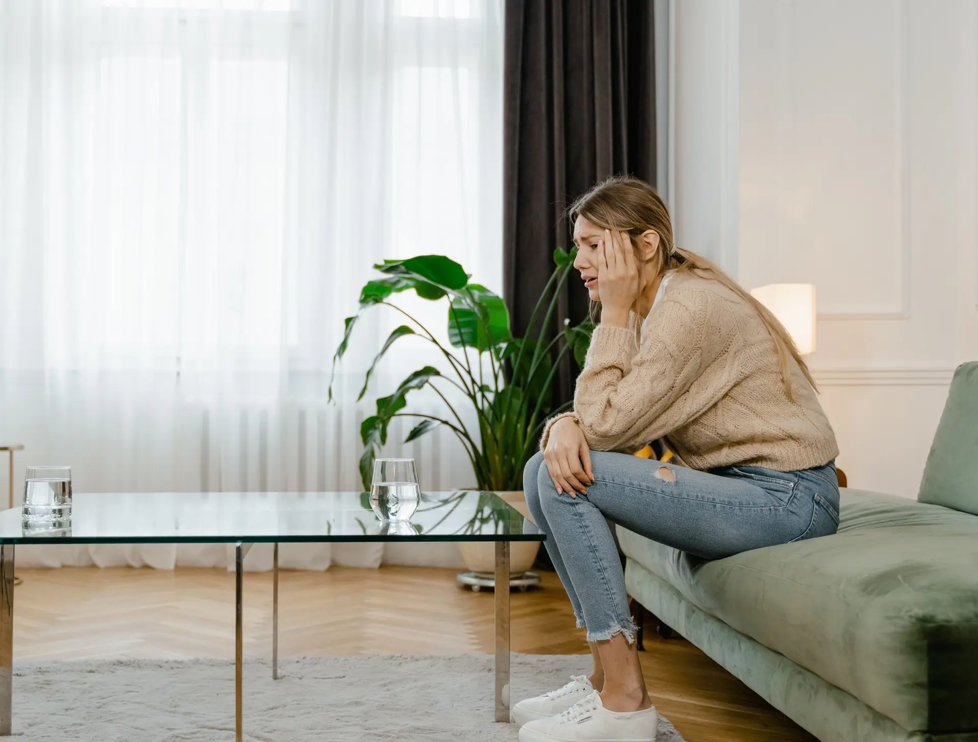 Woman feeling tired and achy from chronic inflammation